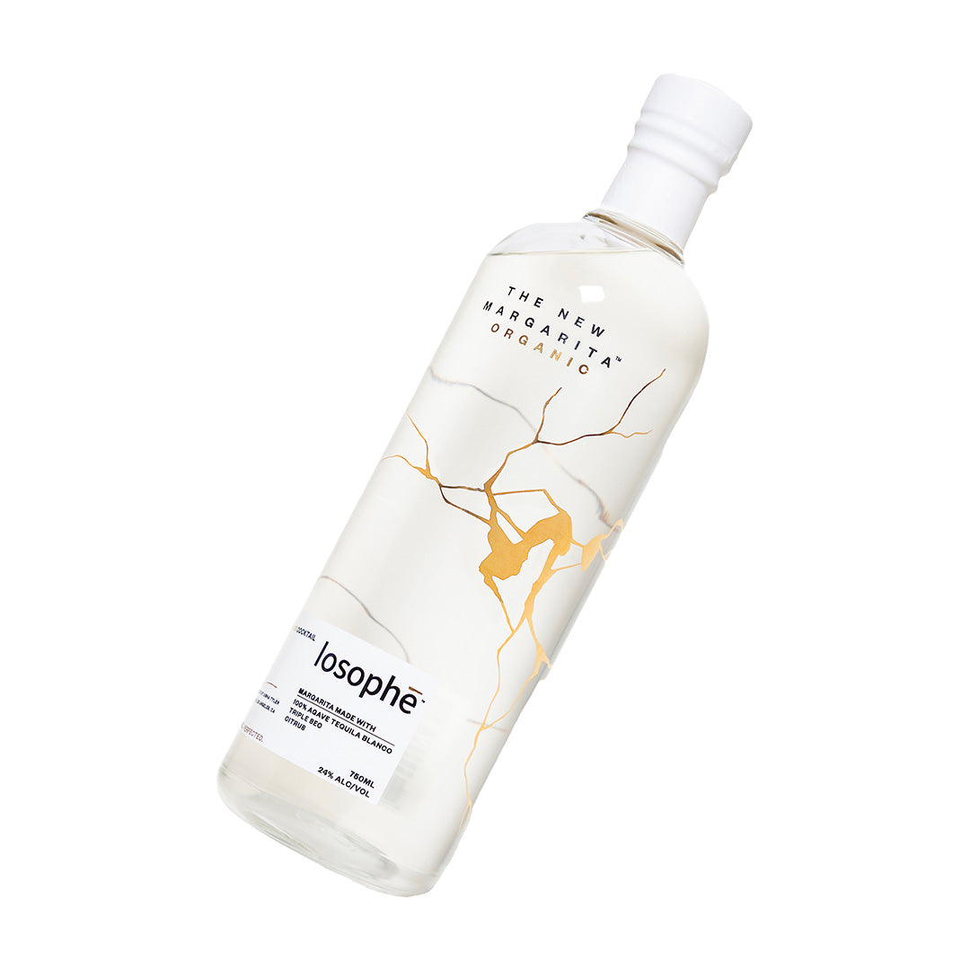 Losophe Margarita bottle with marble design on a white background