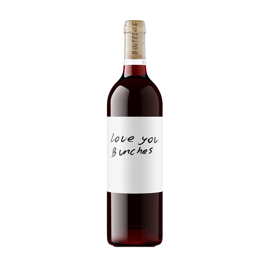 Red Wine bottle with a label reading 'love you bunches' on a white background