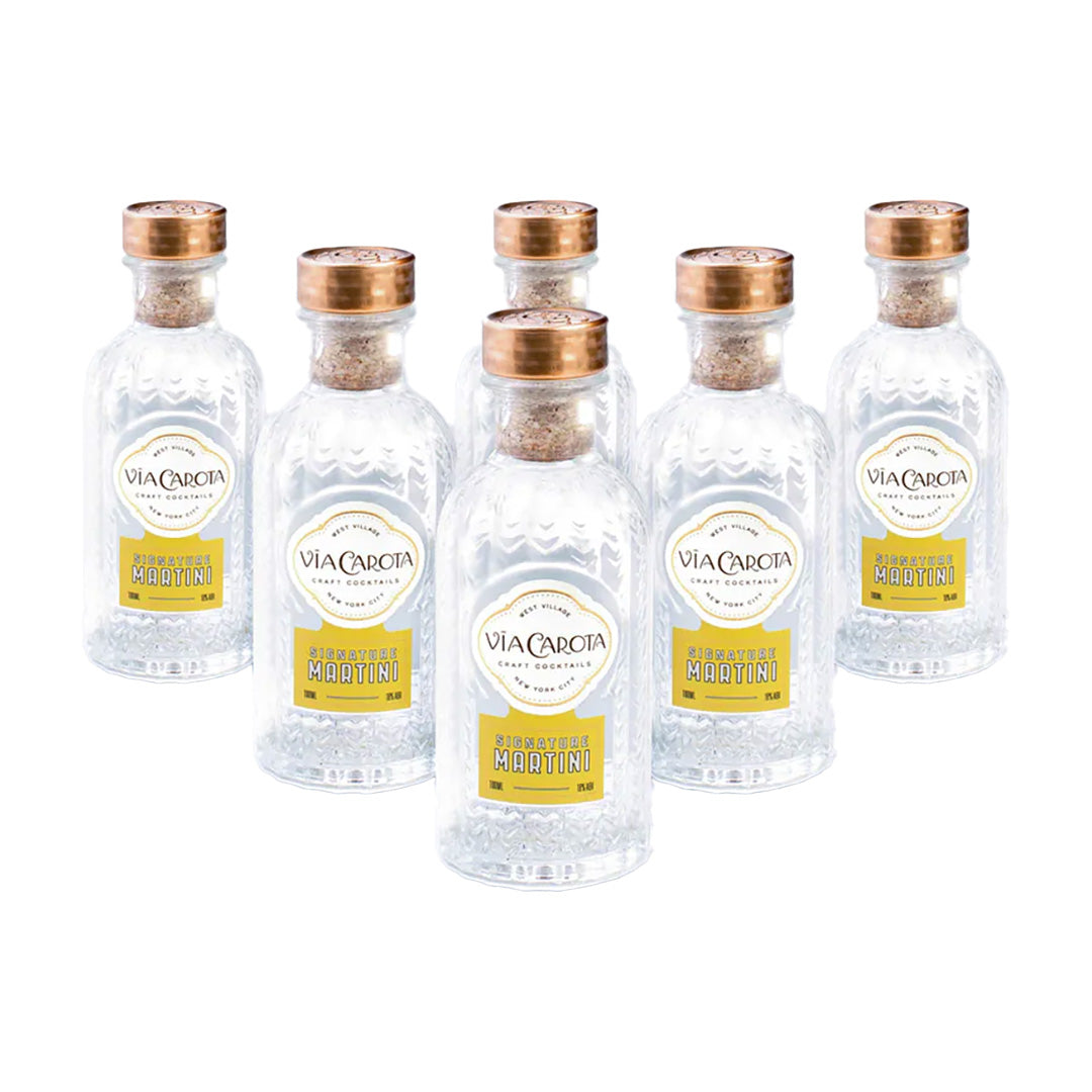 Set of six Via Carcica Classic Martini bottles with gold caps on a white background