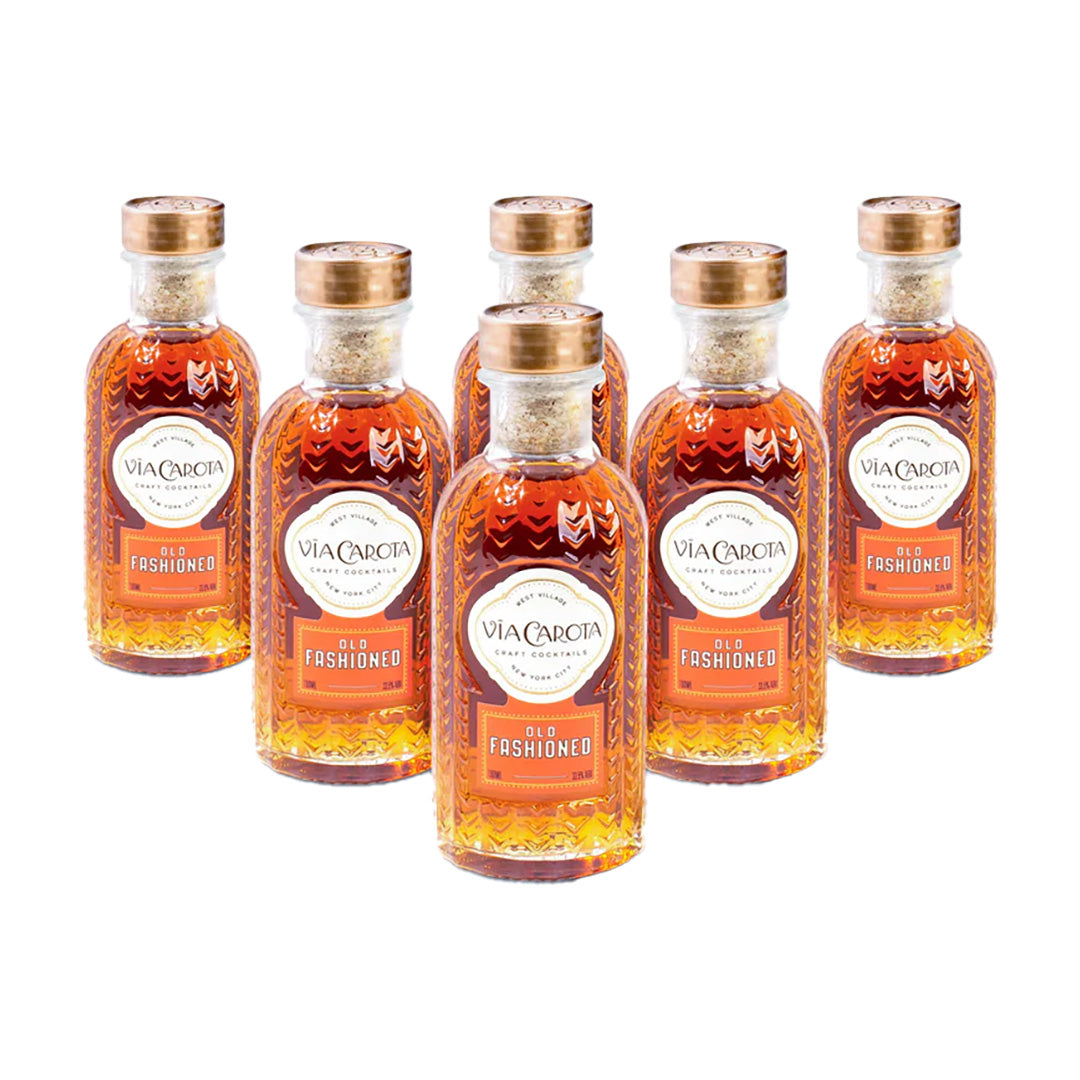 Set of six Via Carcotta Old Fashioned bottles on a white background