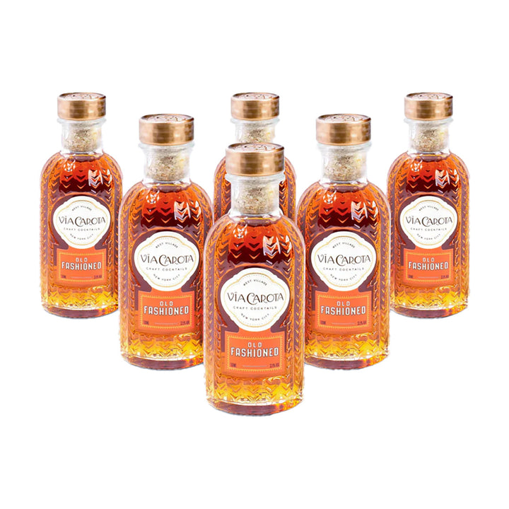 Set of six Via Carcotta Old Fashioned bottles on a white background