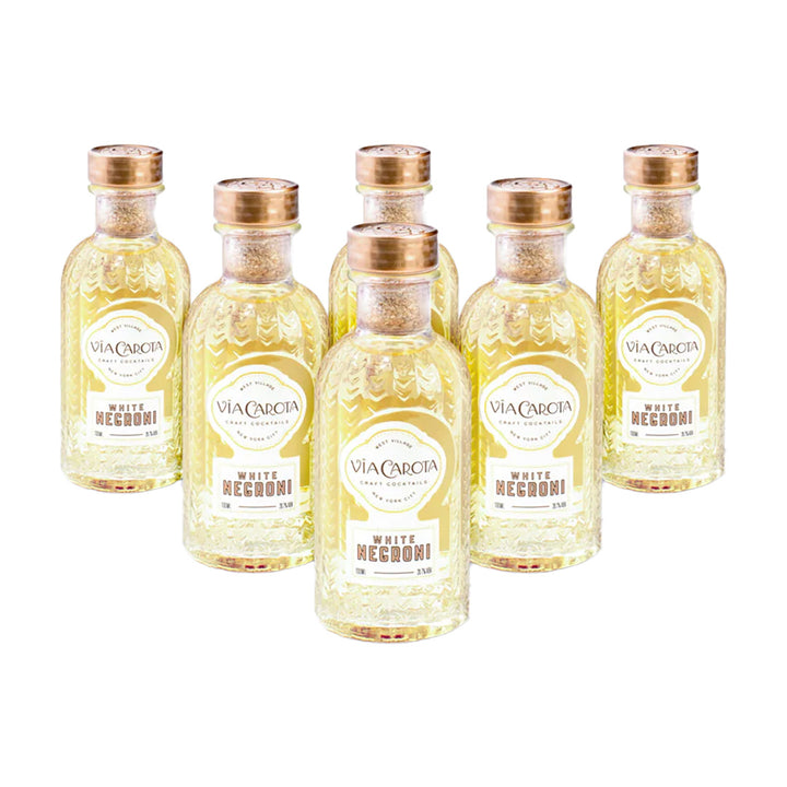 Set of six Via Carola White Negroni bottles on a white background